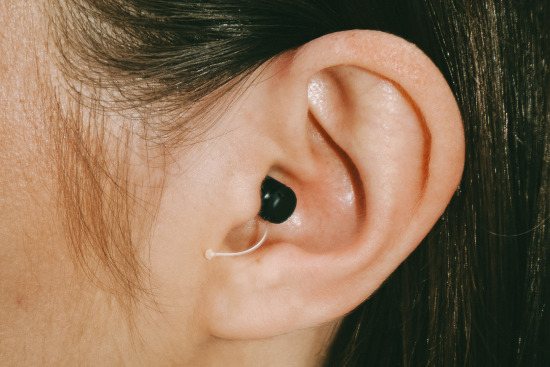 Side view of a woman with an Eargo 7 in her ear 