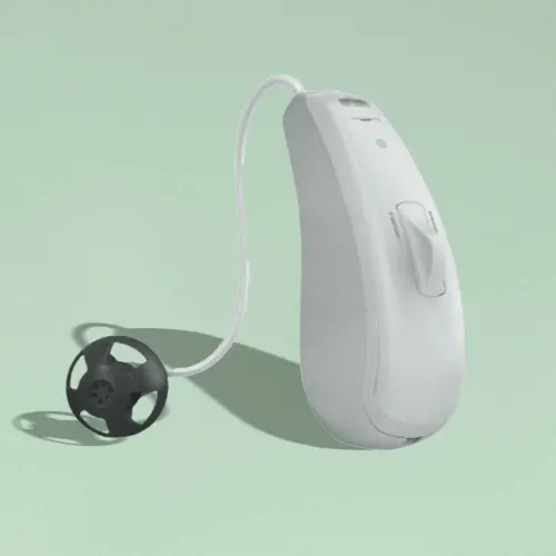Enhance Select 50 hearing aids on green background