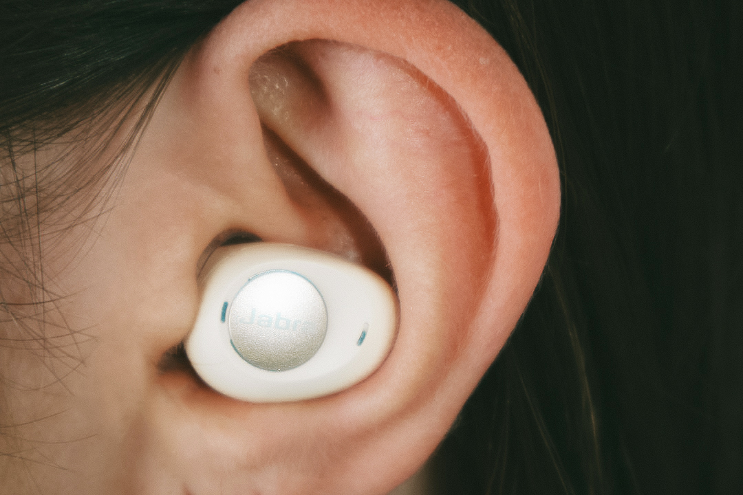Earbud in a person’s ear
