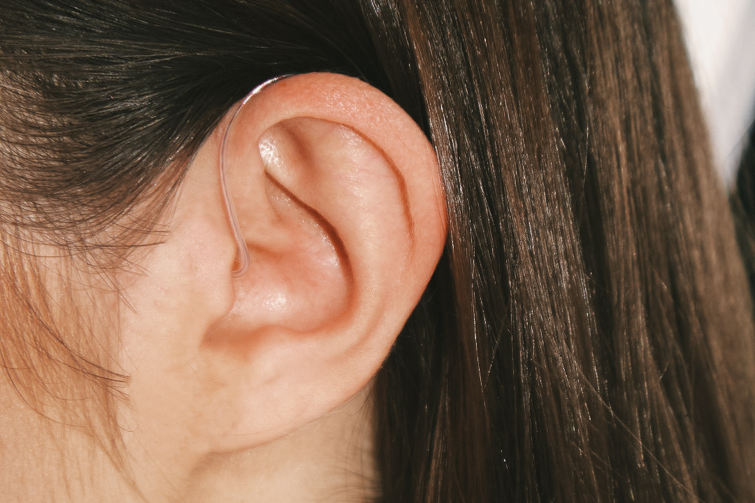 Hearing aid in a person’s ear