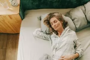 Woman sleeping peacefully in bed