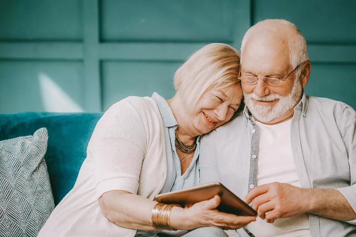 older couple looking at tablet together
