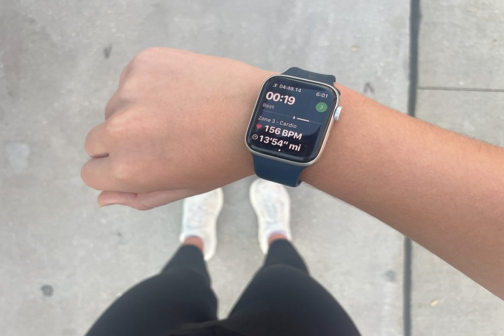 Runner using an Apple Watch to track data through Joggo